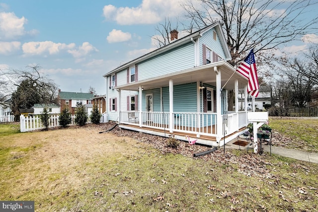 view of front facade with a front yard