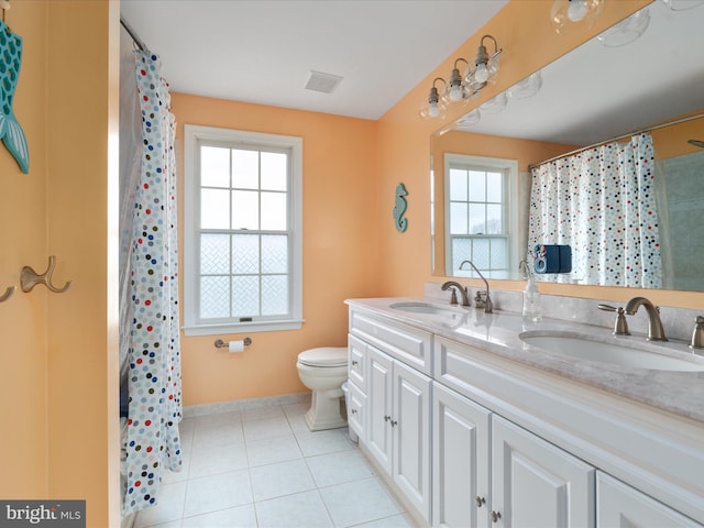 bathroom featuring tile patterned flooring, vanity, toilet, and a shower with curtain