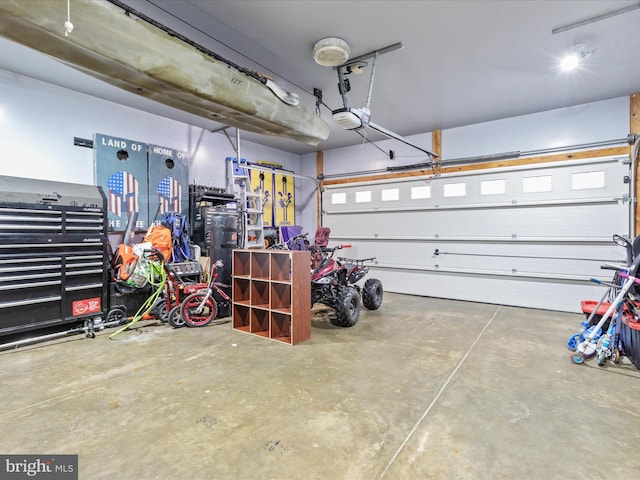 garage featuring a garage door opener