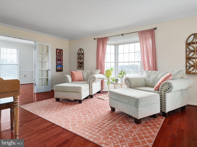 living room with plenty of natural light, french doors, and hardwood / wood-style flooring