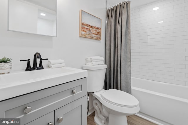 6136 Sinbad Pl, Columbia, MD 21045 - full bathroom with vanity, wood-type flooring, toilet, and shower / tub combo with curtain