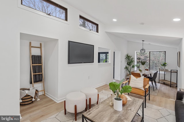 6136 Sinbad Pl, Columbia, MD 21045 - living room featuring light hardwood / wood-style flooring and a healthy amount of sunlight