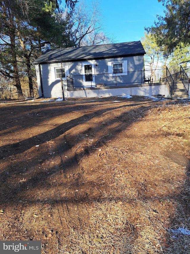 view of front facade featuring a deck