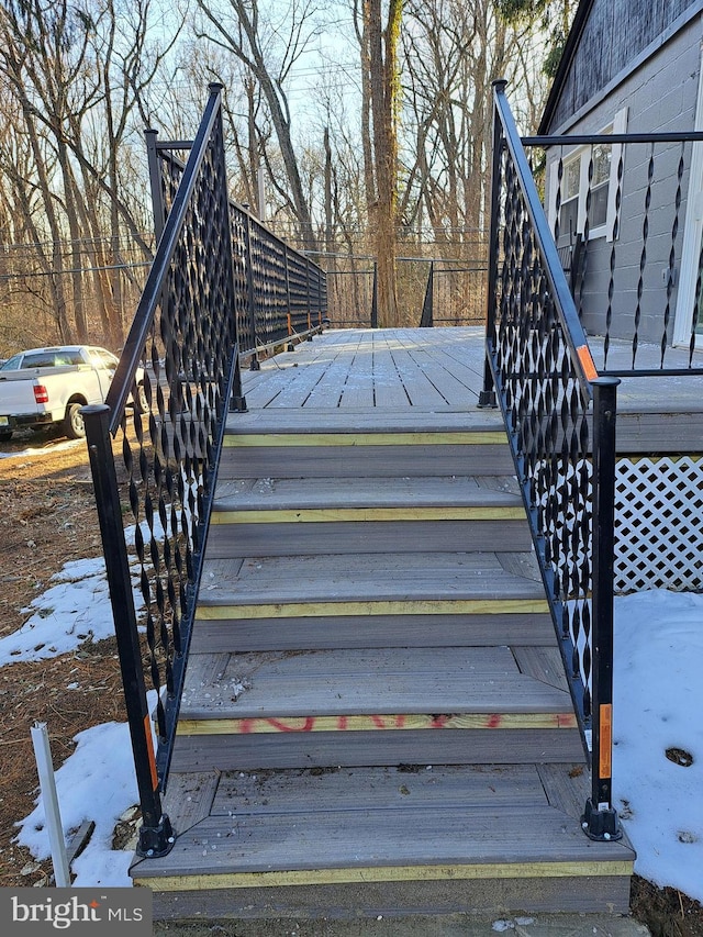 view of snow covered deck