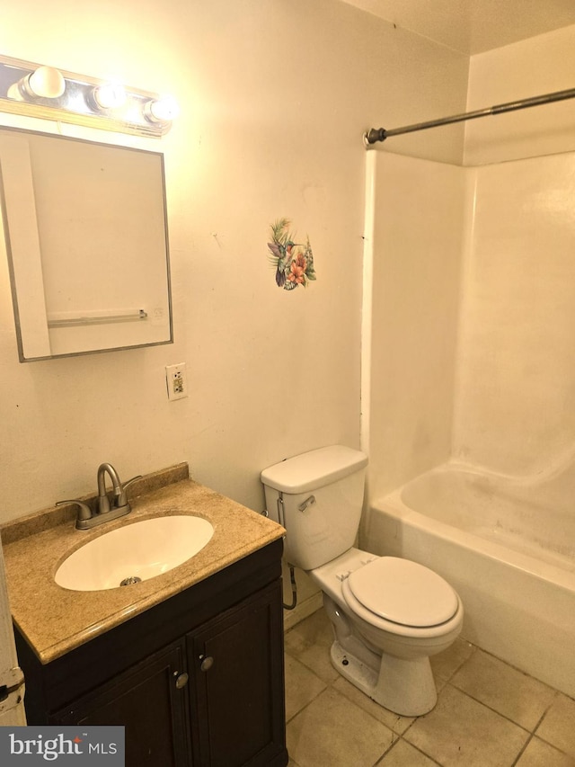 full bathroom with tile patterned flooring, vanity, toilet, and  shower combination