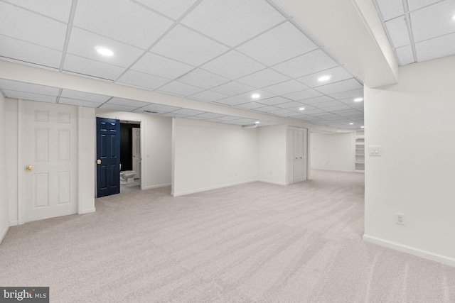 basement with light carpet