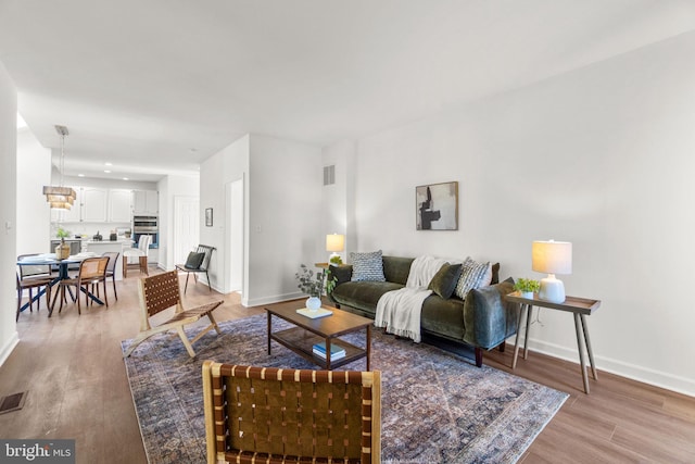 living room featuring light hardwood / wood-style floors