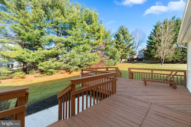 deck featuring a lawn