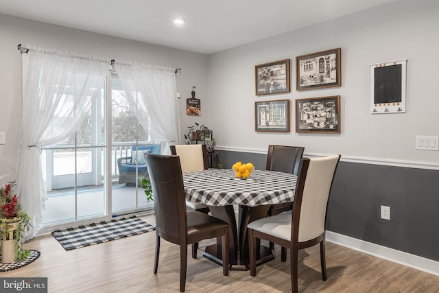 dining area featuring hardwood / wood-style flooring