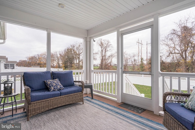 sunroom / solarium featuring plenty of natural light