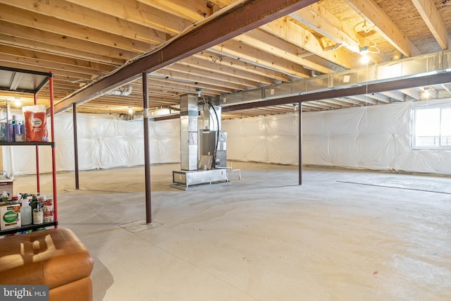 basement featuring heating unit