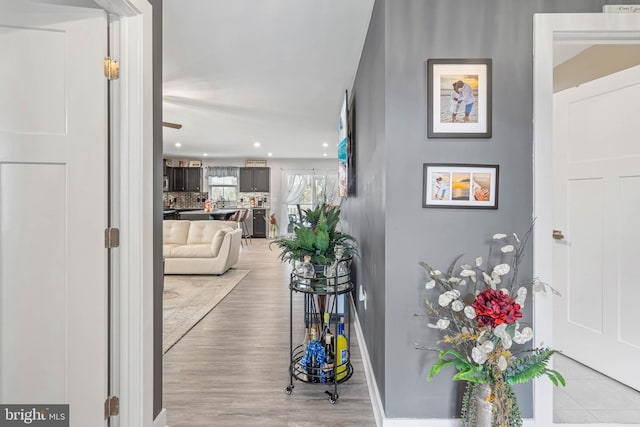 hallway featuring light hardwood / wood-style flooring