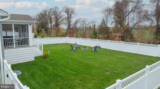 view of yard featuring a sunroom