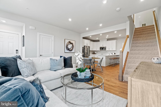 living room featuring light hardwood / wood-style flooring