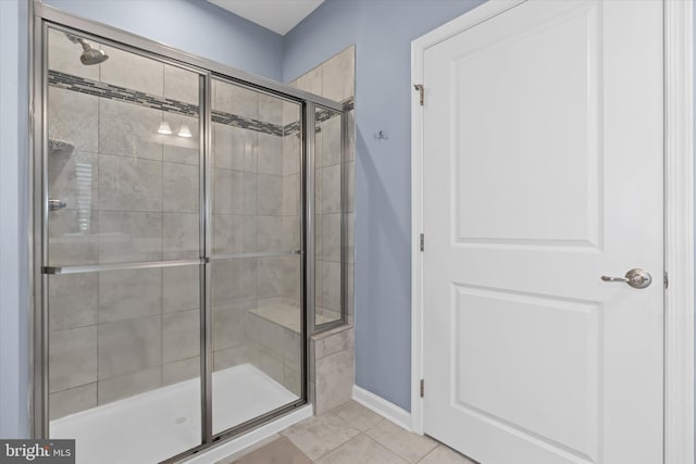 bathroom featuring tile patterned floors and walk in shower