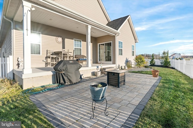 view of patio with a fire pit and grilling area