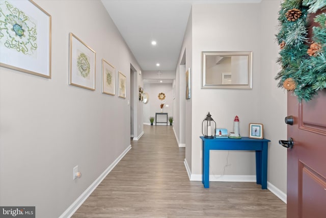 hallway featuring light wood-type flooring