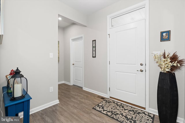 foyer entrance featuring hardwood / wood-style flooring