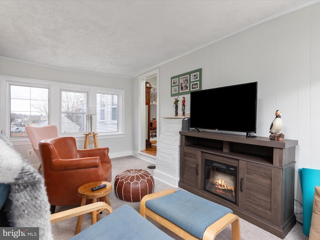 living room with crown molding, light colored carpet, a fireplace, and a textured ceiling