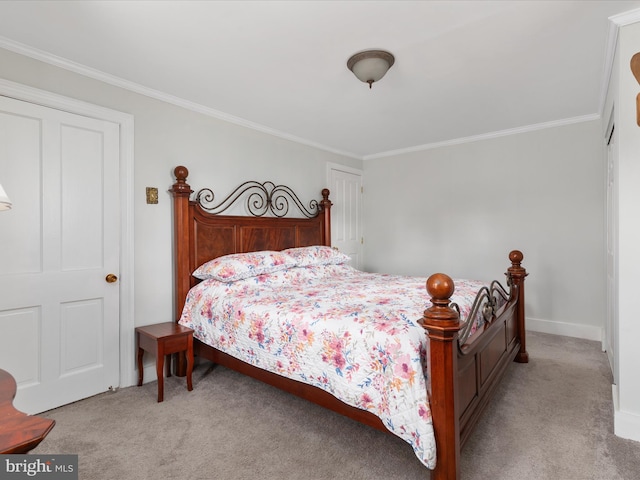 bedroom with crown molding and light carpet