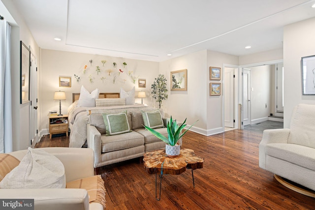 bedroom featuring dark hardwood / wood-style flooring