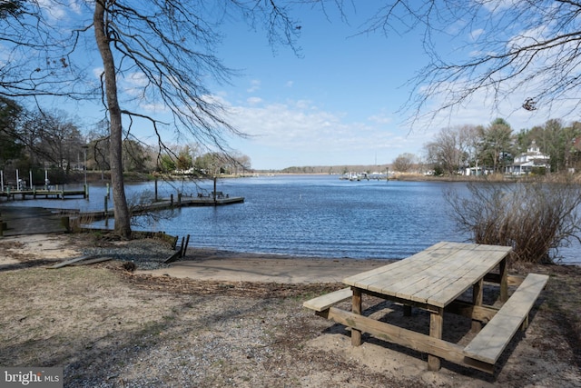 view of dock with a water view