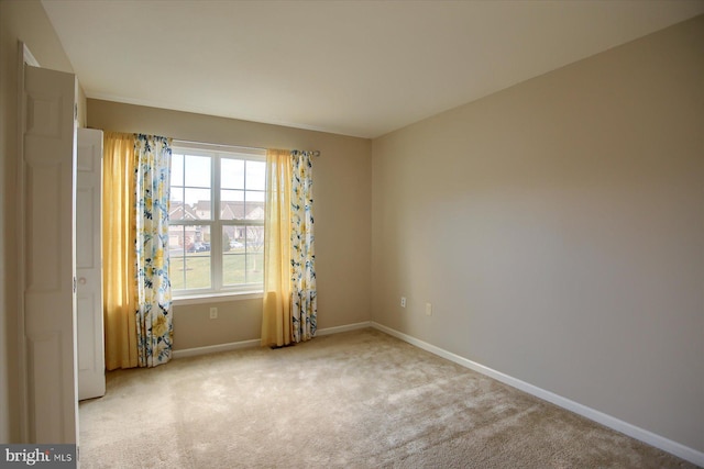 view of carpeted spare room