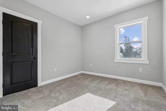 view of carpeted spare room