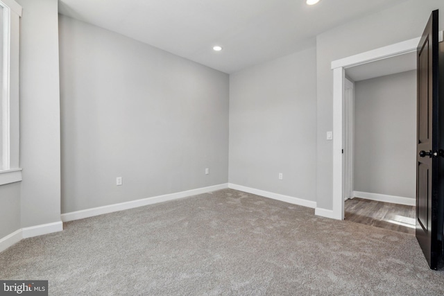 unfurnished bedroom with carpet flooring