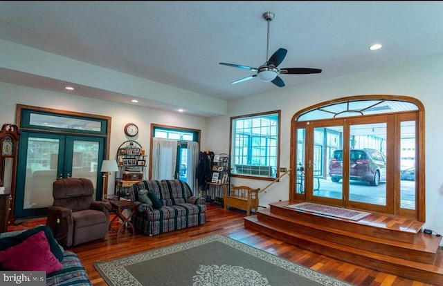 living room featuring hardwood / wood-style flooring, ceiling fan, and french doors