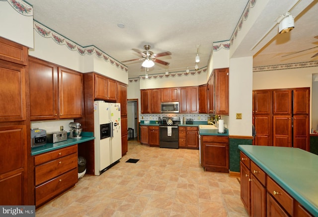 kitchen with black range with electric stovetop, ceiling fan, white refrigerator with ice dispenser, backsplash, and a textured ceiling