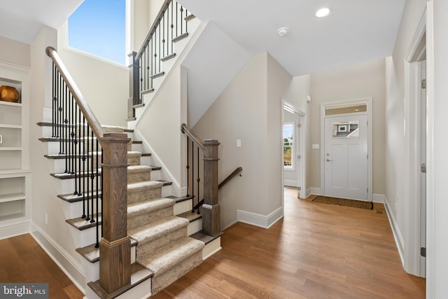 entrance foyer featuring hardwood / wood-style floors