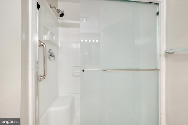 bathroom with an enclosed shower