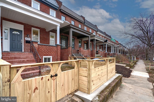 view of property exterior featuring a porch