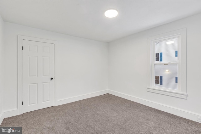 empty room with carpet floors