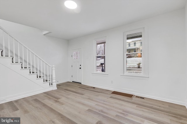 entrance foyer with light wood-type flooring