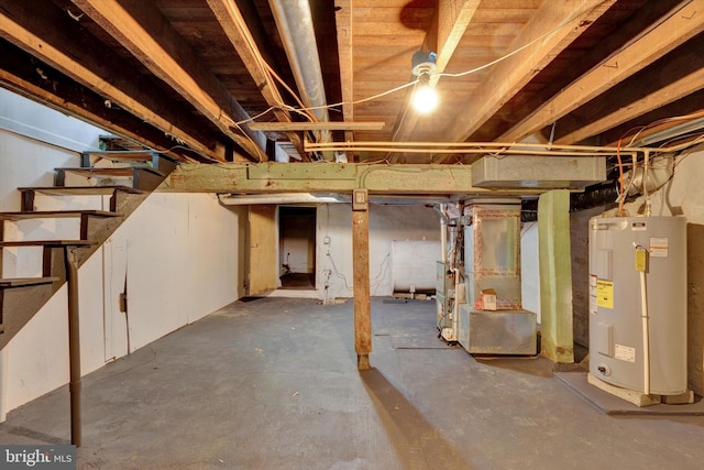 basement with electric water heater and heating unit