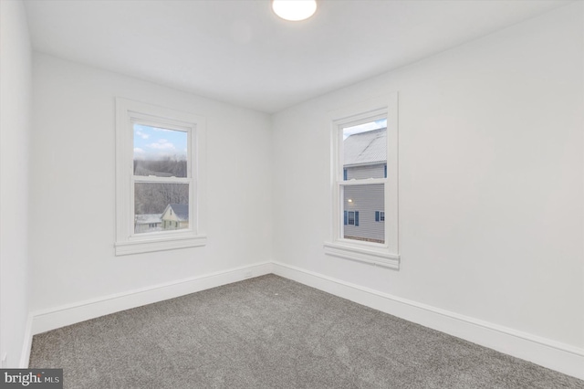 unfurnished room featuring carpet floors