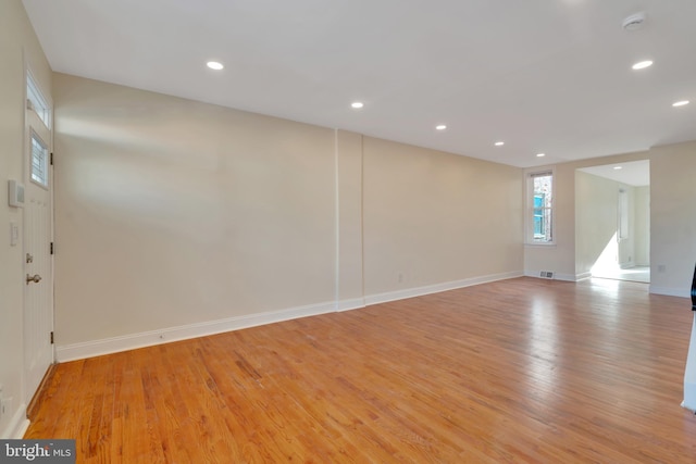 spare room with light wood-type flooring