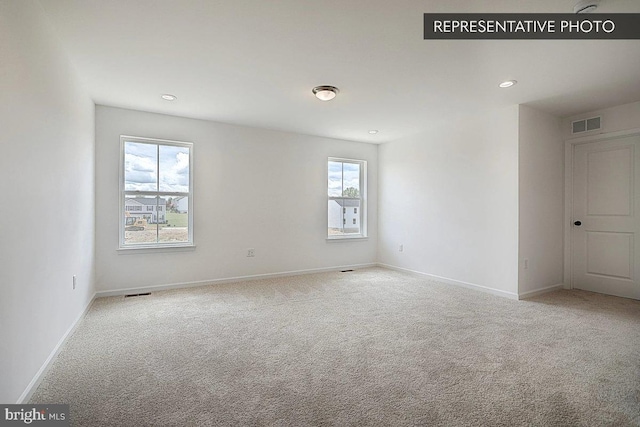 view of carpeted spare room