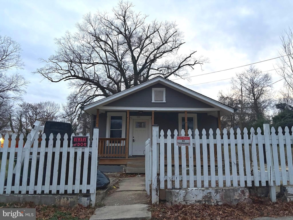 bungalow-style house featuring covered porch