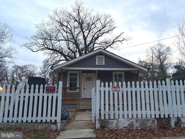 bungalow-style house featuring covered porch