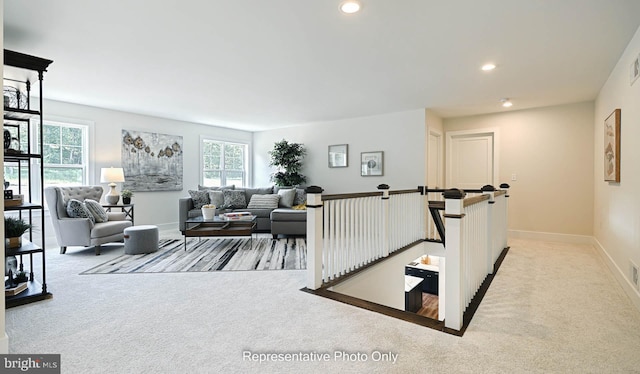 living room with light colored carpet