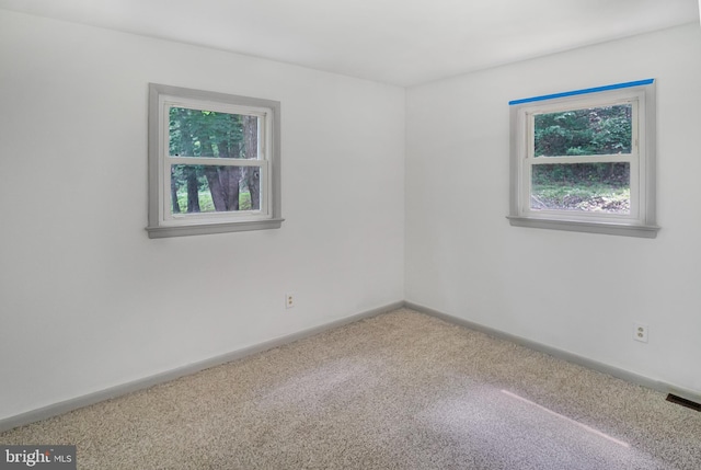 view of carpeted spare room