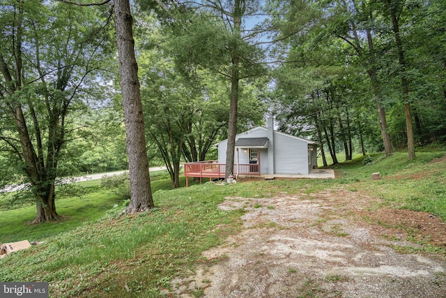 view of yard featuring a deck