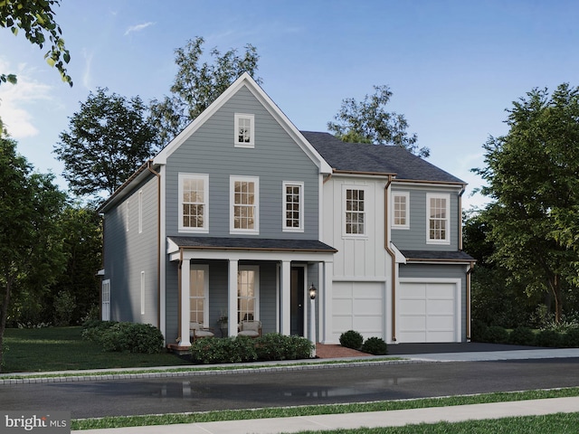 front of property featuring a garage and covered porch