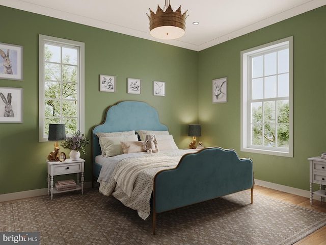 bedroom featuring crown molding