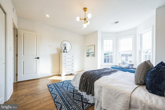 bedroom featuring hardwood / wood-style flooring