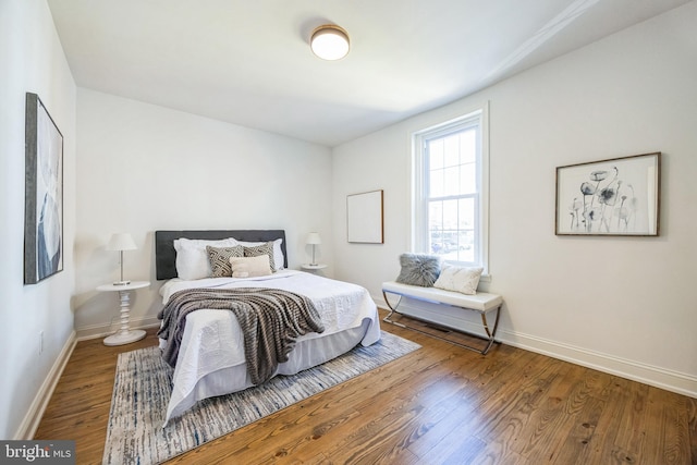 bedroom featuring wood-type flooring