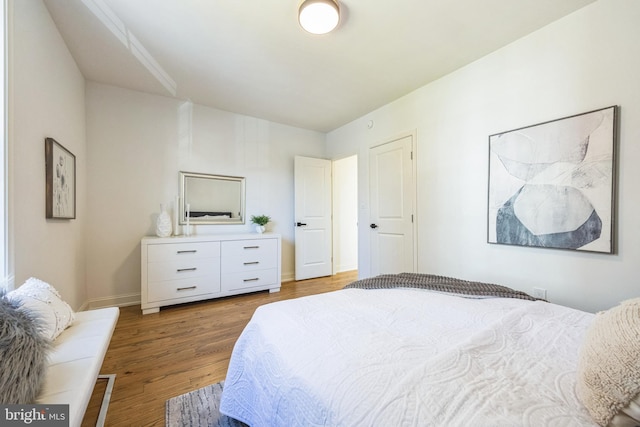 bedroom featuring hardwood / wood-style floors